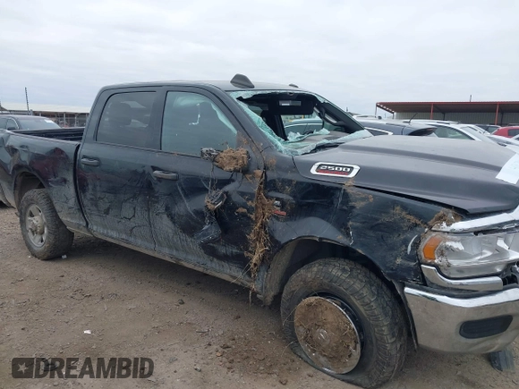 2023 Ram 2500 Tradesman z VIN 3C6UR5CL0PG614831, wystawiony jako IAAI lot #41367939 z przebiegiem 70 439 mil mil oraz . Historia ofert i sprzedaży dostępna na DreamBid. Obrazek 6.