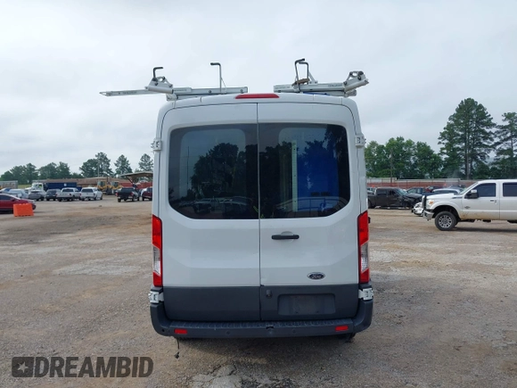 2015 Ford Transit Cargo with VIN 1FTNR1CM2FKB29029, listed as a IAAI auction lot 42286089 with 130,845 mi miles and . Bid and sale history available at DreamBid. Image 16.