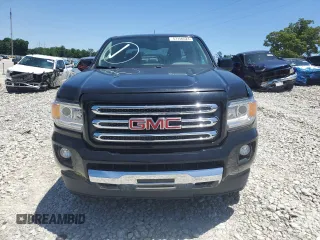 2015 GMC Canyon 4WD SLE with VIN 1GTG6BE32F1115990, listed as a Copart auction lot 71295314 with 118,913 mi miles and Salvage Title. Bid and sale history available at carsss.com. Image 10.