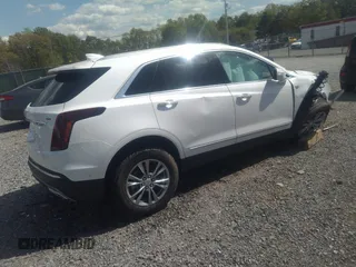 2023 Cadillac XT5 AWD Premium Luxury with VIN 1GYKNDRS5PZ141071, listed as a IAAI auction lot 36571530 with 2,822 mi miles and . Bid and sale history available at DreamBid. Image 4.