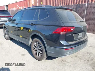 2021 Volkswagen Tiguan S with VIN 3VV1B7AX2MM142289, listed as a IAAI auction lot 42403346 with 71,182 mi miles and . Bid and sale history available at DreamBid. Image 3.