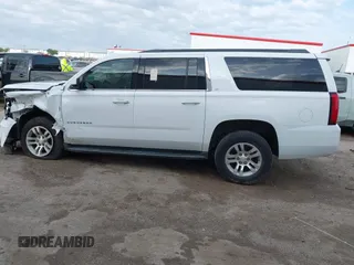 2015 Chevrolet Suburban LT with VIN 1GNSCJKC9FR702598, listed as a IAAI auction lot 41909771 with 150,206 mi miles and . Bid and sale history available at DreamBid. Image 14.