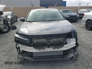 2024 Honda Civic Touring z VIN 2HGFE1F98RH336464, wystawiony jako Copart lot #50504775 z przebiegiem 14 655 mil mil oraz Szkoda całkowita • Salvage title. Historia ofert i sprzedaży dostępna na DreamBid. Obrazek 5.