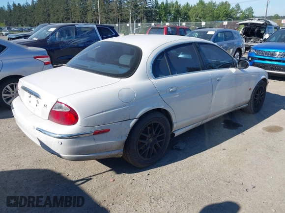 2004 Jaguar S-Type with VIN SAJEA01U74HM96220, listed as a IAAI auction lot 42180627 with 160,015 mi miles and . Bid and sale history available at DreamBid. Image 4.