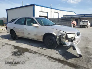 2000 Toyota Camry CE with VIN 4T1BG22K5YU733157, listed as a Copart auction lot 53935955 with 156,640 mi miles and Salvage Title. Bid and sale history available at DreamBid. Image 4.