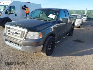 2005 Ford F-150 STX with VIN 1FTRX12W15KD34012, listed as a IAAI auction lot 41095300 with 178,984 mi miles. Bid and sale history available at carsss.com. Image 2.