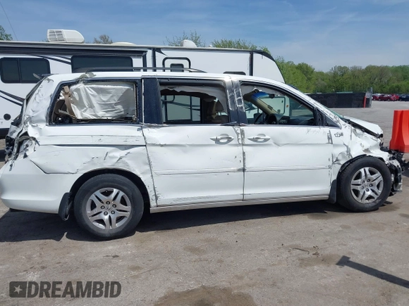 2007 Honda Odyssey EX-L with VIN 5FNRL38617B141003, listed as a IAAI auction lot 39232543 with 195,096 mi miles and . Bid and sale history available at DreamBid. Image 13.