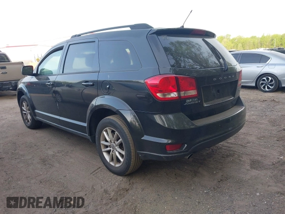 2013 Dodge Journey SXT with VIN 3C4PDCBG2DT705504, listed as a IAAI auction lot 42115012 with 224,275 mi miles. Bid and sale history available at carsss.com. Image 3.