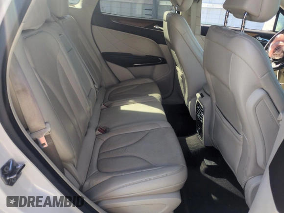 2015 Lincoln MKC z VIN 5LMTJ2AH7FUJ26375, wystawiony jako Copart lot #57830425 z przebiegiem 96 169 mil mil oraz Szkoda całkowita • Salvage title. Historia ofert i sprzedaży dostępna na DreamBid. Obrazek 11.
