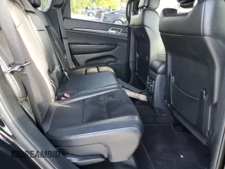 2018 Jeep Grand Cherokee Laredo E with VIN 1C4RJEAGXJC246874, listed as a Copart auction lot 56722005 with 101,493 mi miles and Salvage title. Bid and sale history available at DreamBid. Image 11.