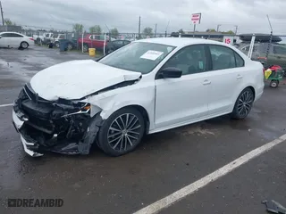 2016 Volkswagen Jetta Sedan 1.8T Sport with VIN 3VWD17AJ3GM404199, listed as a IAAI auction lot 41934993 with 43,183 mi miles. Bid and sale history available at carsss.com. Image 18.