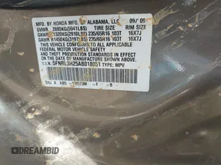 2010 Honda Odyssey LX with VIN 5FNRL3H25AB018051, listed as a IAAI auction lot 41886393 with 256,554 mi miles. Bid and sale history available at carsss.com. Image 9.