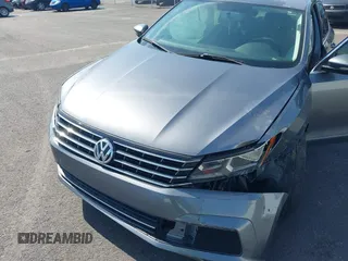 2016 Volkswagen Passat S with VIN 1VWAT7A30GC013544, listed as a IAAI auction lot 42643834 with 163,000 mi miles and . Bid and sale history available at DreamBid. Image 6.