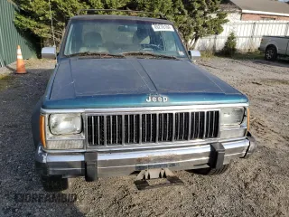 1996 Jeep Cherokee Country with VIN 1J4FJ78S9TL252803, listed as a Copart auction lot 49278184 with 180,420 mi miles and Clean Title. Bid and sale history available at carsss.com. Image 5.