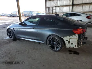 2015 BMW M4 with VIN WBS3R9C54FK335119, listed as a Copart auction lot 42120434 with 57,384 mi miles. Bid and sale history available at carsss.com. Image 2.