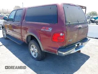 2003 Ford F-150 XLT with VIN 1FTRW08L63KA20475, listed as a IAAI auction lot 42610305 with Not provided miles and . Bid and sale history available at DreamBid. Image 3.