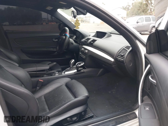2013 BMW 1 Series 135i with VIN WBAUC9C54DVY60154, listed as a IAAI auction lot 42354743 with 159,571 mi miles and . Bid and sale history available at DreamBid. Image 5.