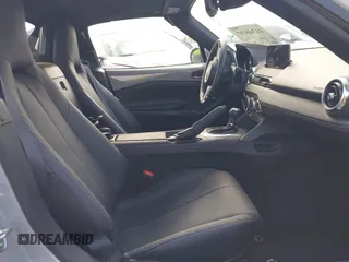 2024 Mazda MX-5 Miata Grand Touring z VIN JM1NDAM76R0602860, wystawiony jako IAAI lot #41346197 z przebiegiem 1 891 mil mil oraz . Historia ofert i sprzedaży dostępna na DreamBid. Obrazek 8.