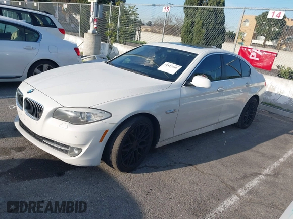 2013 BMW 5 Series 528i with VIN WBAXG5C55DD233592, listed as a IAAI auction lot 41827491 with 113,342 mi miles and . Bid and sale history available at carsss.com. Image 2.