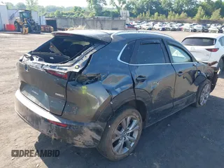 2023 Mazda CX-30 S Carbon Edition with VIN 3MVDMBCM6PM510231, listed as a IAAI auction lot 42579591 with 29,240 mi miles and . Bid and sale history available at DreamBid. Image 4.