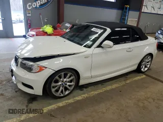 2012 BMW 1 Series 135i with VIN WBAUN7C51CVM26822, listed as a Copart auction lot 46906125 with 60,196 mi miles and Salvage title. Bid and sale history available at DreamBid. Image 1.