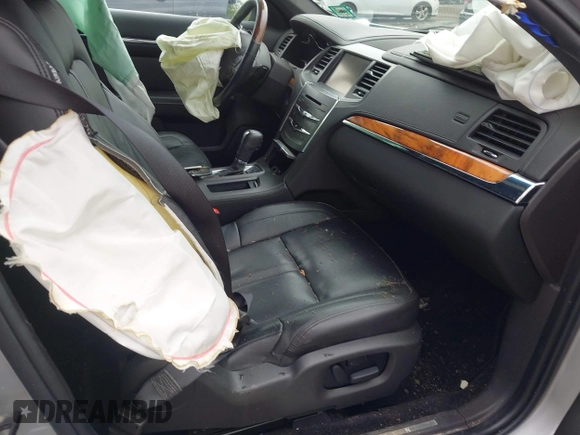 2013 Lincoln MKS with VIN 1LNHL9DK4DG606551, listed as a IAAI auction lot 42343140 with 70,424 mi miles and . Bid and sale history available at DreamBid. Image 5.