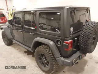 2024 Jeep Wrangler Sport S with VIN 1C4PJXDG4RW218996, listed as a IAAI auction lot 42088856 with 10,717 mi miles and . Bid and sale history available at DreamBid. Image 3.