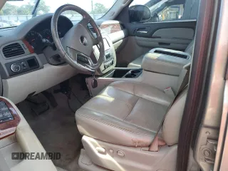 2009 GMC Yukon SLT w/4SA with VIN 1GKEC33359R222406, listed as a Copart auction lot 76913644 with 234,952 mi miles and Salvage Title. Bid and sale history available at carsss.com. Image 7.