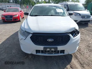 2015 Ford Police Interceptor z VIN 1FAHP2MK7FG203950, wystawiony jako IAAI lot #42182617 z przebiegiem 165 426 mil mil oraz . Historia ofert i sprzedaży dostępna na DreamBid. Obrazek 12.