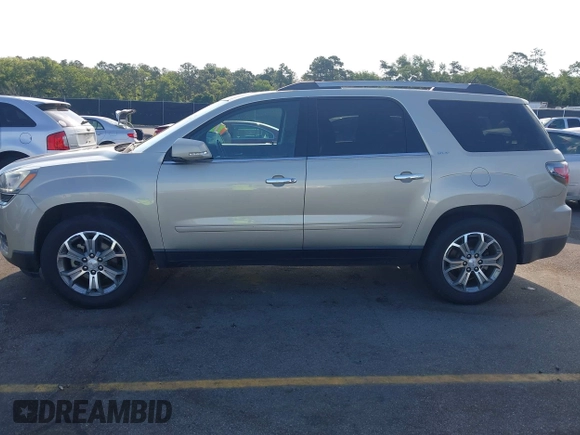 2014 GMC Acadia SLT z VIN 1GKKRSKDXEJ300483, wystawiony jako IAAI lot #42333981 z przebiegiem 167 155 mil mil oraz . Historia ofert i sprzedaży dostępna na DreamBid. Obrazek 14.