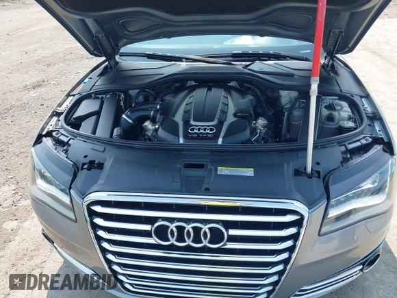 2013 Audi A8 4.0L with VIN WAUA2AFD5DN021950, listed as a IAAI auction lot 42472512 with 126,964 mi miles and . Bid and sale history available at DreamBid. Image 10.