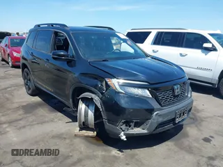 2021 Honda Passport Elite with VIN 5FNYF8H07MB003506, listed as a IAAI auction lot 42571906 with 42,323 mi miles and . Bid and sale history available at DreamBid. Image 1.