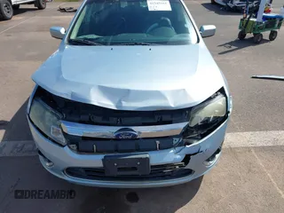 2010 Ford Fusion Hybrid z VIN 3FADP0L3XAR138980, wystawiony jako IAAI lot #41545161 z przebiegiem 92 386 mil mil oraz . Historia ofert i sprzedaży dostępna na DreamBid. Obrazek 6.