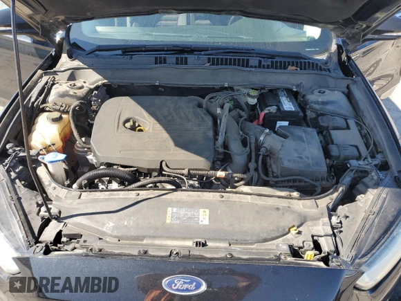 2015 Ford Fusion SE z VIN 1FA6P0HDXF5103053, wystawiony jako Copart lot #57763875 z przebiegiem 121 789 mil mil oraz Szkoda całkowita • Salvage title. Historia ofert i sprzedaży dostępna na DreamBid. Obrazek 11.