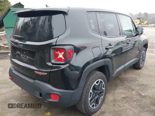 2015 Jeep Renegade Trailhawk with VIN ZACCJBCT0FPC45038, listed as a IAAI auction lot 41796152 with 91,456 mi miles and . Bid and sale history available at DreamBid. Image 4.