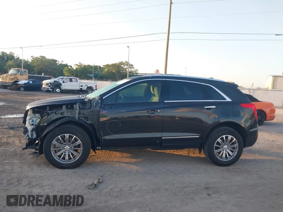 2019 Cadillac XT5 Luxury FWD with VIN 1GYKNCRS6KZ253400, listed as a IAAI auction lot 41984279 with 55,412 mi miles and . Bid and sale history available at DreamBid. Image 14.