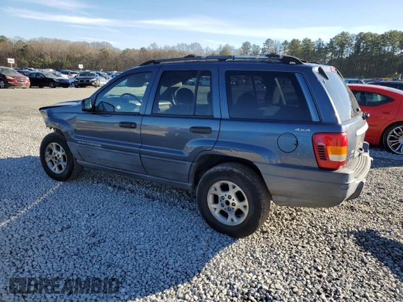 2001 Jeep Grand Cherokee Laredo z VIN 1J4GW48S91C578800, wystawiony jako Copart lot #87934695 z przebiegiem 250 784 mil mil oraz Szkoda całkowita • Salvage title. Historia ofert i sprzedaży dostępna na DreamBid. Obrazek 2.