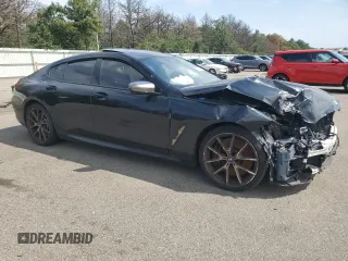 2020 BMW 8 Series M850i with VIN WBAGV8C07LBP48826, listed as a Copart auction lot 65445504 with 32,147 mi miles and Salvage title. Bid and sale history available at DreamBid. Image 4.
