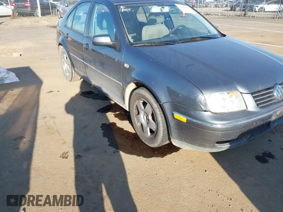 2004 Volkswagen Jetta GL z VIN 3VWRA69M64M044291, wystawiony jako IAAI lot #41882666 z przebiegiem 205 029 mil mil oraz . Historia ofert i sprzedaży dostępna na DreamBid. Obrazek 6.
