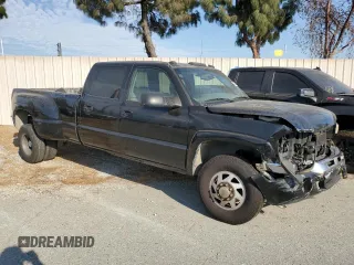 2005 GMC Sierra 1500 with VIN 1GTJC33235F813444, listed as a Copart auction lot 74541684 with 520,838 mi miles and Salvage Title. Bid and sale history available at DreamBid. Image 4.