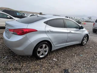2012 Hyundai Elantra GLS PZEV with VIN 5NPDH4AE6CH082187, listed as a Copart auction lot 50733205 with 124,521 mi miles and Salvage Title. Bid and sale history available at carsss.com. Image 3.