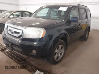 2009 Honda Pilot EX-L with VIN 5FNYF48509B036410, listed as a IAAI auction lot 41859708 with 216,558 mi miles. Bid and sale history available at carsss.com. Image 2.