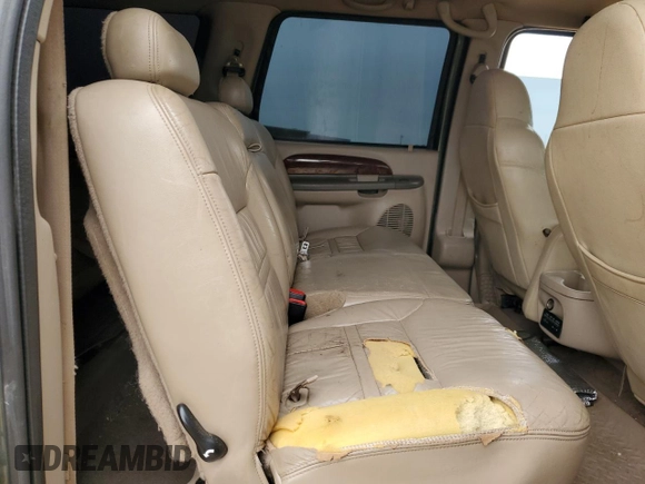 2001 Ford Excursion Limited z VIN 1FMSU43F91EA10949, wystawiony jako Copart lot #51003325 z przebiegiem 252 341 mil mil oraz Szkoda całkowita • Salvage title. Historia ofert i sprzedaży dostępna na DreamBid. Obrazek 11.