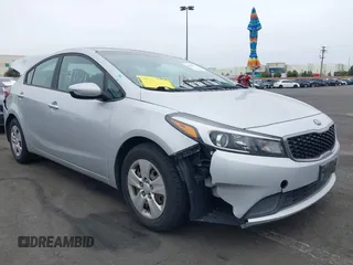 2017 Kia Forte LX with VIN 3KPFK4A74HE100015, listed as a IAAI auction lot 41894601 with 73,945 mi miles and . Bid and sale history available at carsss.com. Image 1.