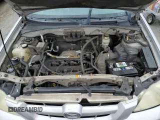 2006 Mazda Tribute i with VIN 4F2YZ02Z26KM14821, listed as a Copart auction lot 71718434 with 318,841 mi miles and Salvage Title. Bid and sale history available at carsss.com. Image 13.