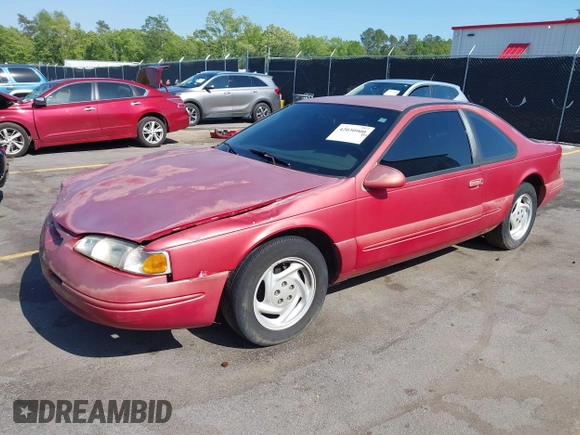 1996 Ford Thunderbird LX z VIN 1FALP62W0TH142986, wystawiony jako IAAI lot #42030900 z przebiegiem 168 993 mil mil oraz . Historia ofert i sprzedaży dostępna na DreamBid. Obrazek 21.