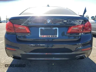 2020 BMW 5 Series 530e with VIN WBAJA9C00LCD60874, listed as a Copart auction lot 87960825 with 91,036 mi miles and Salvage Title. Bid and sale history available at DreamBid. Image 6.
