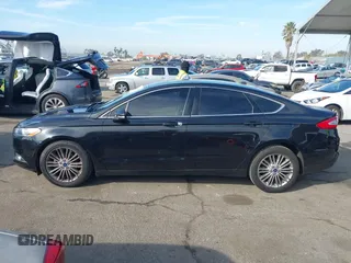 2014 Ford Fusion SE with VIN 3FA6P0HD4ER265241, listed as a IAAI auction lot 41473021 with 117,226 mi miles and . Bid and sale history available at DreamBid. Image 14.