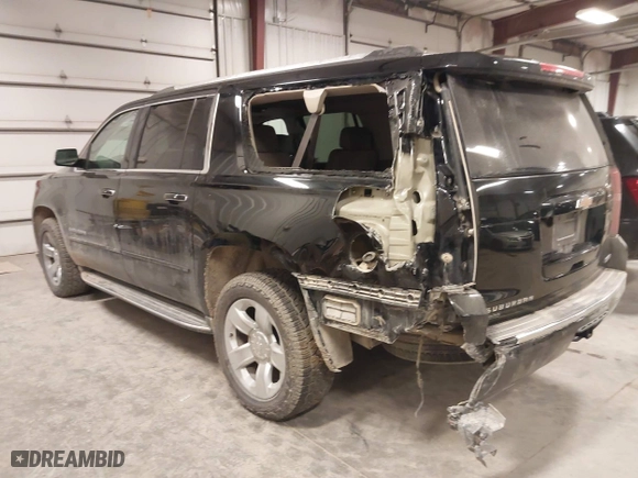2017 Chevrolet Suburban Premier with VIN 1GNSKJKC0HR250854, listed as a IAAI auction lot 41541476 with 128,231 mi miles. Bid and sale history available at carsss.com. Image 3.