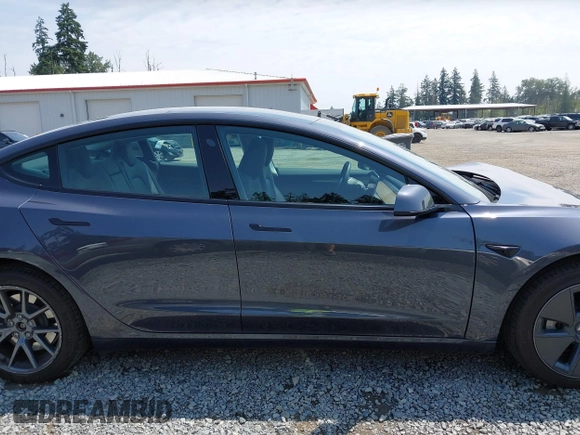 2023 Tesla Model 3 with VIN 5YJ3E1EA6PF664045, listed as a IAAI auction lot 42561039 with 18,708 mi miles and . Bid and sale history available at DreamBid. Image 14.